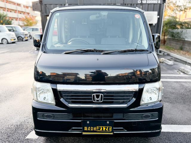 バモス 　Ｍ　禁煙車　両側スライドドア　純正ＯＰナビ　１セグＴＶ　エアコン　キーレス　ヘッドライトレベライザー　ＥＴＣ　４ナンバーバン登録　パワーウインドー　フルフラット　ＡＴ　集中ドアロック　グレーインテリア（6枚目）