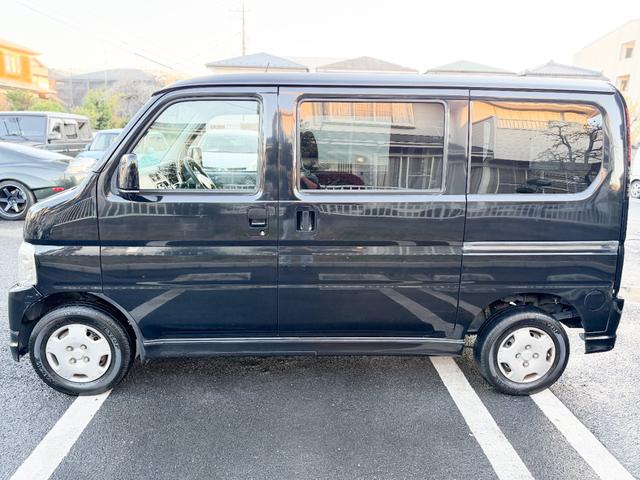 バモス 　Ｍ　禁煙車　両側スライドドア　純正ＯＰナビ　１セグＴＶ　エアコン　キーレス　ヘッドライトレベライザー　ＥＴＣ　４ナンバーバン登録　パワーウインドー　フルフラット　ＡＴ　集中ドアロック　グレーインテリア（8枚目）