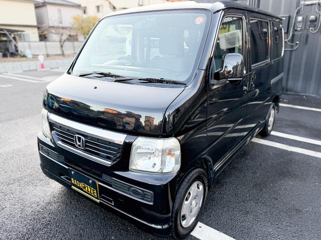 バモス 　Ｍ　禁煙車　両側スライドドア　純正ＯＰナビ　１セグＴＶ　エアコン　キーレス　ヘッドライトレベライザー　ＥＴＣ　４ナンバーバン登録　パワーウインドー　フルフラット　ＡＴ　集中ドアロック　グレーインテリア（10枚目）