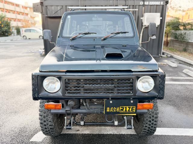 ジムニー ワイルドウインドリミテッド　ターボ　４ＷＤ　ＡＴ　ＬＴゴツゴツタイヤ　４ナンバー構造変更車　公認リフトアップ　ショートバンパー　ＡＭＦデッキ　デフロック　ルーフキャリア　レザー調シートカバー　エアコン　パナソニックＥＴＣ（6枚目）