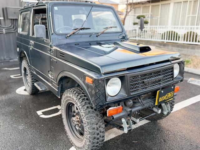 ジムニー ワイルドウインドリミテッド　ターボ　４ＷＤ　ＡＴ　ＬＴゴツゴツタイヤ　４ナンバー構造変更車　公認リフトアップ　ショートバンパー　ＡＭＦデッキ　デフロック　ルーフキャリア　レザー調シートカバー　エアコン　パナソニックＥＴＣ（11枚目）