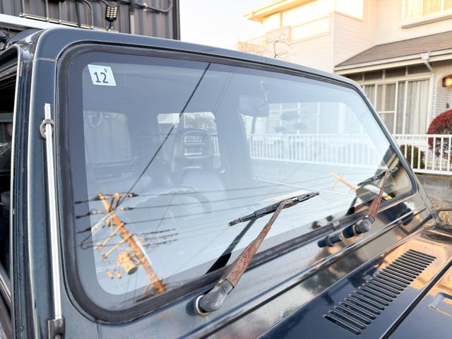 ジムニー ワイルドウインドリミテッド　ターボ　４ＷＤ　ＡＴ　ＬＴゴツゴツタイヤ　４ナンバー構造変更車　公認リフトアップ　ショートバンパー　ＡＭＦデッキ　デフロック　ルーフキャリア　レザー調シートカバー　エアコン　パナソニックＥＴＣ（26枚目）