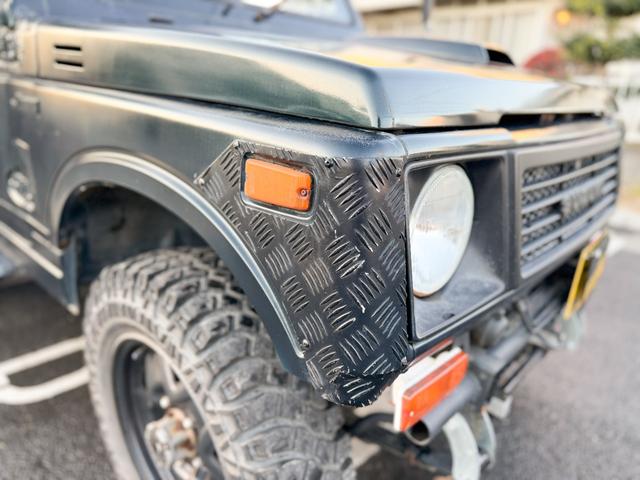 ジムニー ワイルドウインドリミテッド　ターボ　４ＷＤ　ＡＴ　ＬＴゴツゴツタイヤ　４ナンバー構造変更車　公認リフトアップ　ショートバンパー　ＡＭＦデッキ　デフロック　ルーフキャリア　レザー調シートカバー　エアコン　パナソニックＥＴＣ（28枚目）