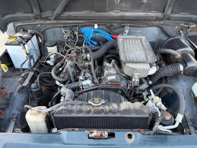 ジムニー ワイルドウインドリミテッド　ターボ　４ＷＤ　ＡＴ　ＬＴゴツゴツタイヤ　４ナンバー構造変更車　公認リフトアップ　ショートバンパー　ＡＭＦデッキ　デフロック　ルーフキャリア　レザー調シートカバー　エアコン　パナソニックＥＴＣ（34枚目）