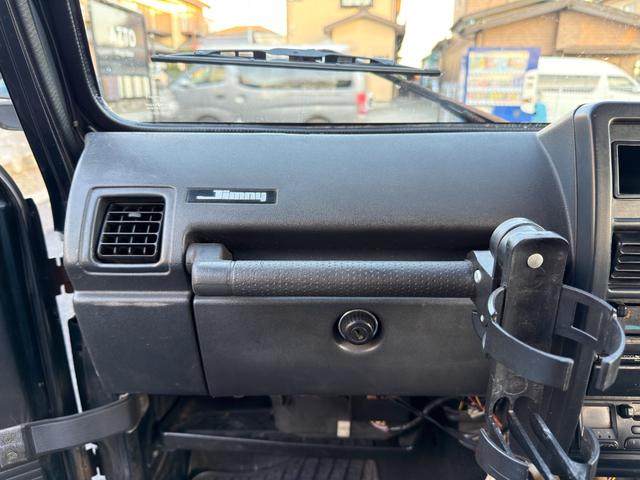 ジムニー ワイルドウインドリミテッド　ターボ　４ＷＤ　ＡＴ　ＬＴゴツゴツタイヤ　４ナンバー構造変更車　公認リフトアップ　ショートバンパー　ＡＭＦデッキ　デフロック　ルーフキャリア　レザー調シートカバー　エアコン　パナソニックＥＴＣ（43枚目）