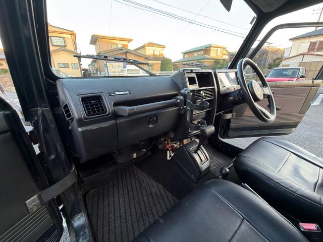 ジムニー ワイルドウインドリミテッド　ターボ　４ＷＤ　ＡＴ　ＬＴゴツゴツタイヤ　４ナンバー構造変更車　公認リフトアップ　ショートバンパー　ＡＭＦデッキ　デフロック　ルーフキャリア　レザー調シートカバー　エアコン　パナソニックＥＴＣ（67枚目）