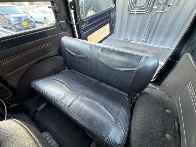 ジムニー ワイルドウインドリミテッド　ターボ　４ＷＤ　ＡＴ　ＬＴゴツゴツタイヤ　４ナンバー構造変更車　公認リフトアップ　ショートバンパー　ＡＭＦデッキ　デフロック　ルーフキャリア　レザー調シートカバー　エアコン　パナソニックＥＴＣ（69枚目）