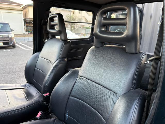 ジムニー ワイルドウインドリミテッド　ターボ　４ＷＤ　ＡＴ　ＬＴゴツゴツタイヤ　４ナンバー構造変更車　公認リフトアップ　ショートバンパー　ＡＭＦデッキ　デフロック　ルーフキャリア　レザー調シートカバー　エアコン　パナソニックＥＴＣ（77枚目）