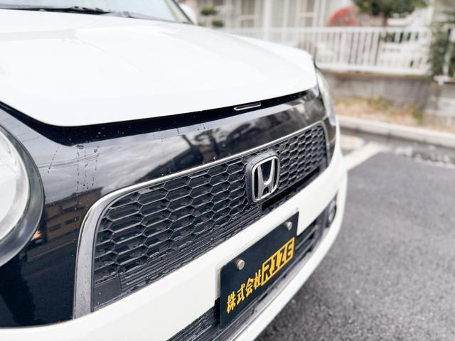 Ｎ－ＯＮＥ プレミアム　ツアラー・Ｌパッケージ　禁煙車　ターボ　パドルシフト　純正１５インチアルミ　ＨＩＤヘッド　フォグ　純正ＯＰインターナビ　１セグＴＶ　バックカメラ　フルオートエアコン　スマートキー　プッシュスタート　クルーズコントロール（29枚目）