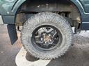 ワイルドウインドリミテッド　ターボ　４ＷＤ　ＡＴ　ＬＴゴツゴツタイヤ　４ナンバー構造変更車　公認リフトアップ　ショートバンパー　ＡＭＦデッキ　デフロック　ルーフキャリア　レザー調シートカバー　エアコン　パナソニックＥＴＣ（22枚目）