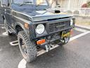 ワイルドウインドリミテッド　ターボ　４ＷＤ　ＡＴ　ＬＴゴツゴツタイヤ　４ナンバー構造変更車　公認リフトアップ　ショートバンパー　ＡＭＦデッキ　デフロック　ルーフキャリア　レザー調シートカバー　エアコン　パナソニックＥＴＣ（33枚目）