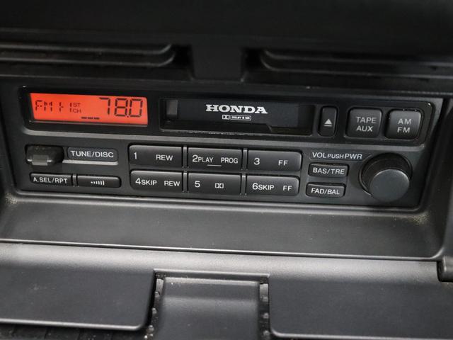 S2000 ベースグレード BBS17インチアルミRG-R/禁煙車/社外マフラー/ハーフレザーシート/キーレスエントリー/HIDヘッドライト/電動ソフトトップ/革巻きステアリングホイール/SRSエアバッグ/リモコンキー(9枚目)