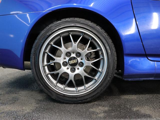 S2000 ベースグレード BBS17インチアルミRG-R/禁煙車/社外マフラー/ハーフレザーシート/キーレスエントリー/HIDヘッドライト/電動ソフトトップ/革巻きステアリングホイール/SRSエアバッグ/リモコンキー(28枚目)