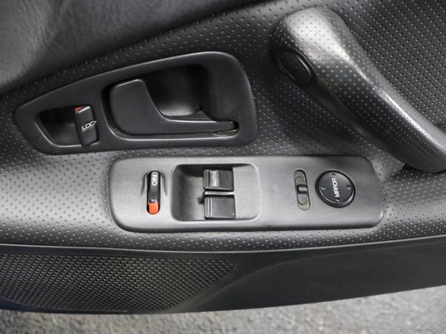 S2000 ベースグレード BBS17インチアルミRG-R/禁煙車/社外マフラー/ハーフレザーシート/キーレスエントリー/HIDヘッドライト/電動ソフトトップ/革巻きステアリングホイール/SRSエアバッグ/リモコンキー(42枚目)