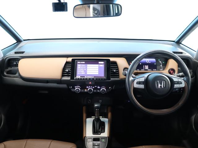 フィット e:HEVリュクス ブラウン革ハーフレザーシート/コンフォートビューパッケージ/置くだけ充電/純正8インチナビ/バックカメラ/Bluetooth接続/衝突軽減ブレーキ/アダプティブクルーズコントロール(6枚目)