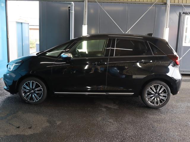 フィット e:HEVリュクス ブラウン革ハーフレザーシート/コンフォートビューパッケージ/置くだけ充電/純正8インチナビ/バックカメラ/Bluetooth接続/衝突軽減ブレーキ/アダプティブクルーズコントロール(32枚目)