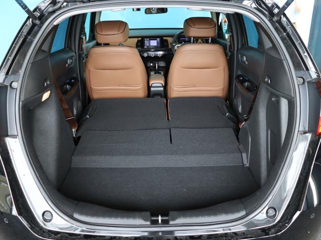 フィット e:HEVリュクス ブラウン革ハーフレザーシート/コンフォートビューパッケージ/置くだけ充電/純正8インチナビ/バックカメラ/Bluetooth接続/衝突軽減ブレーキ/アダプティブクルーズコントロール(34枚目)