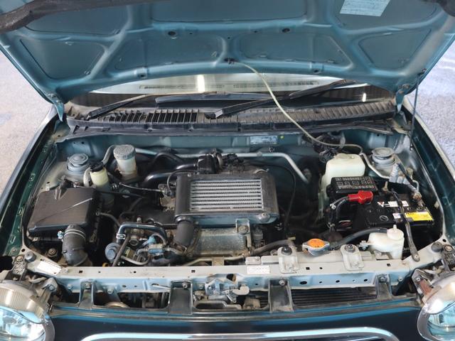 ミラジーノ ミニライトスペシャルターボ　４ＷＤ／５速ＭＴ／禁煙車／純正１４インチアルミホイール／キーレスエントリー／電動格納ミラー／エアコン／パワーステアリング／パワーウインドウ／運転席・助手席エアバッグ／ＣＤ／ブリティッシュグリーンマイカ（13枚目）