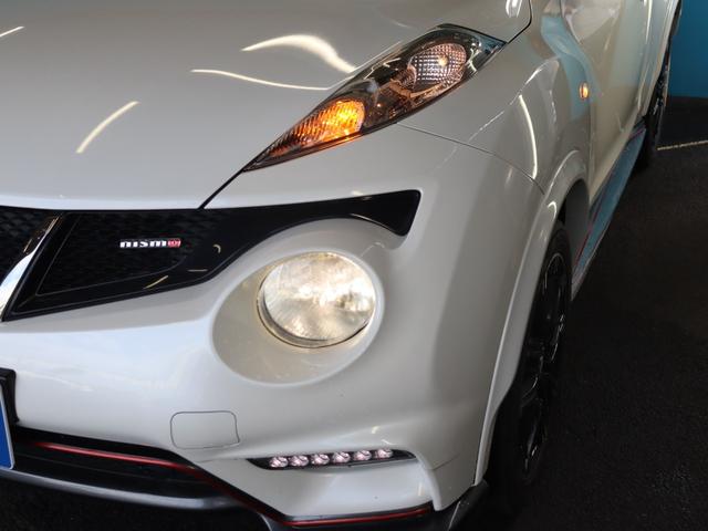 ジューク ニスモ　４ＷＤ／純正ナビ／Ｂｌｕｅｔｏｏｔｈオーディオ／フルセグ／バックカメラ／ＤＶＤ・ＣＤ視聴可能／禁煙／スマートキー／ＥＴＣ／ニスモ専用シート／純正１８インチＡＷ／オートライト／電動格納ミラー（27枚目）