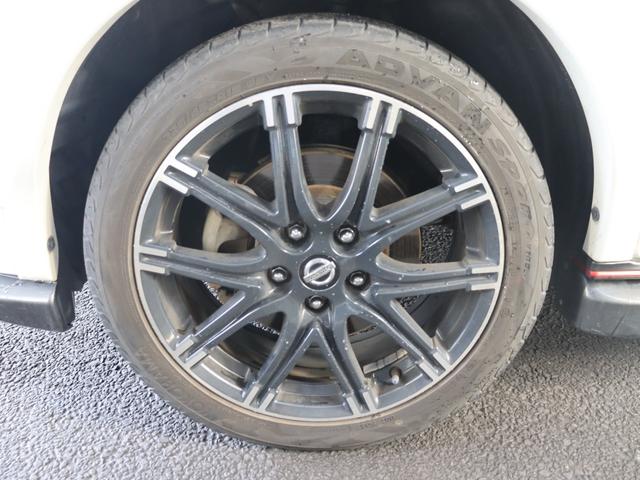 ジューク ニスモ　４ＷＤ／純正ナビ／Ｂｌｕｅｔｏｏｔｈオーディオ／フルセグ／バックカメラ／ＤＶＤ・ＣＤ視聴可能／禁煙／スマートキー／ＥＴＣ／ニスモ専用シート／純正１８インチＡＷ／オートライト／電動格納ミラー（31枚目）