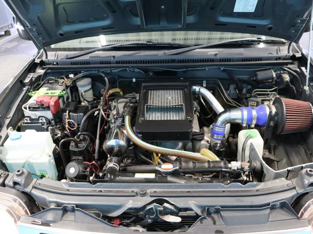 ジムニー クロスアドベンチャー　５ＭＴ／オフロードタニグチＡ８ショック／リフトアップ／ＲＥＣＡＲＯシート／スキッドプレート／フロント・リアショートバンパー／ターボ／ＥＴＣ（61枚目）