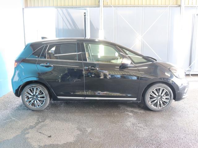 フィット ｅ：ＨＥＶリュクス　ブラウン革ハーフレザーシート／コンフォートビューパッケージ／置くだけ充電／純正８インチナビ／バックカメラ／Ｂｌｕｅｔｏｏｔｈ接続／衝突軽減ブレーキ／アダプティブクルーズコントロール（23枚目）