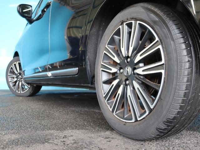 フィット ｅ：ＨＥＶリュクス　ブラウン革ハーフレザーシート／コンフォートビューパッケージ／置くだけ充電／純正８インチナビ／バックカメラ／Ｂｌｕｅｔｏｏｔｈ接続／衝突軽減ブレーキ／アダプティブクルーズコントロール（29枚目）