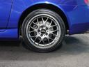 ベースグレード　ＢＢＳ１７インチアルミＲＧ－Ｒ／禁煙車／社外マフラー／ハーフレザーシート／キーレスエントリー／ＨＩＤヘッドライト／電動ソフトトップ／革巻きステアリングホイール／ＳＲＳエアバッグ／リモコンキー（28枚目）
