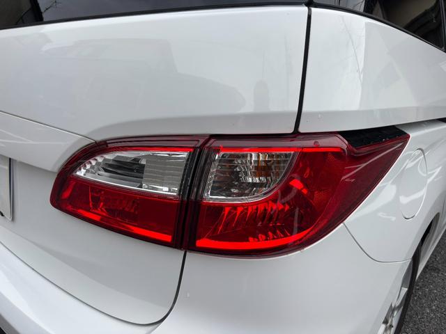 プレマシー 20CS エアロスタイル ツーリングセレ ナビTV バックモニター 電動スライドドア アルパイン後席モニター ETC ケンスタイルエアロ スマートキー HIDライト 純正アルミ フォグ 禁煙車 スペヤーキー ステアリングスイッチ(28枚目)