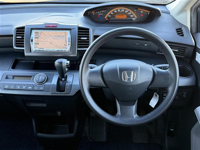 フリード フレックス　ジャストセレクション　法人ワンオーナー禁煙車　純正ナビ　Ｂｌｕｅｔｏｏｔｈ　ＤＶＤ再生機能　ワンセグＴＶ　バックカメラ　ＥＴＣ　パワースライドドア　キーレスキー（20枚目）