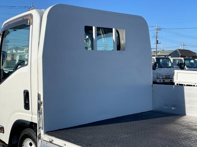 エルフトラック ロングフルフラットロー　２．９５ｔ　標準ロング　全低床　アルミブロック　６速セミＡＴ　鳥居鉄板　荷台床縞板鋼板　工具箱　サイドマーカー　ＡＳＲ　アイドリッグストップ　電動格納ミラー　キーレス　ルームランプ（11枚目）