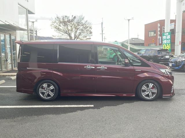 ステップワゴンスパーダ スパーダハイブリッド　Ｇ・ＥＸ　ホンダセンシング　純正９インチナビ　Ｂｌｕｅｔｏｏｔｈオーディオ　ＤＶＤ再生　ＨＤＭＩ　ＵＳＢ　マルチビューモニター　後席フリップダウンモニター　両側パワースライド　アダプティブクルーズコントロール　車高調　ＬＥＤ（52枚目）