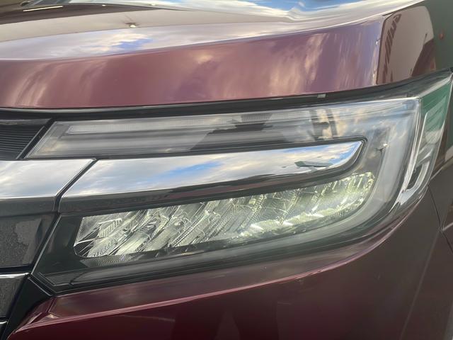 ステップワゴンスパーダ スパーダハイブリッド　Ｇ・ＥＸ　ホンダセンシング　純正９インチナビ　Ｂｌｕｅｔｏｏｔｈオーディオ　ＤＶＤ再生　ＨＤＭＩ　ＵＳＢ　マルチビューモニター　後席フリップダウンモニター　両側パワースライド　アダプティブクルーズコントロール　車高調　ＬＥＤ（56枚目）