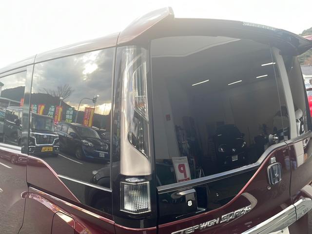 ステップワゴンスパーダ スパーダハイブリッド　Ｇ・ＥＸ　ホンダセンシング　純正９インチナビ　Ｂｌｕｅｔｏｏｔｈオーディオ　ＤＶＤ再生　ＨＤＭＩ　ＵＳＢ　マルチビューモニター　後席フリップダウンモニター　両側パワースライド　アダプティブクルーズコントロール　車高調　ＬＥＤ（61枚目）