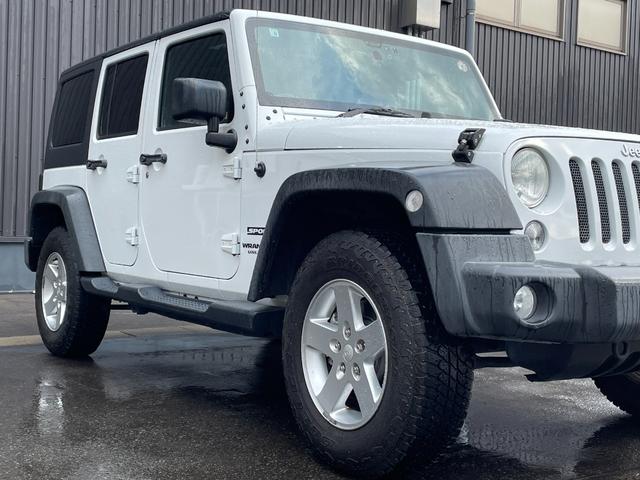 ジープ・ラングラーアンリミテッド スポーツ　社外メモリナビ　フルセグＴＶ　ＣＤ　ＤＶＤ　Ｂｌｕｅｔｏｏｔｈ　後席モニター　バックカメラ　ドライブレコーダー　前のみ　４ＷＤ　ＥＴＣ　サイドモニター　純正アルミホイール　純正フロアマット（48枚目）