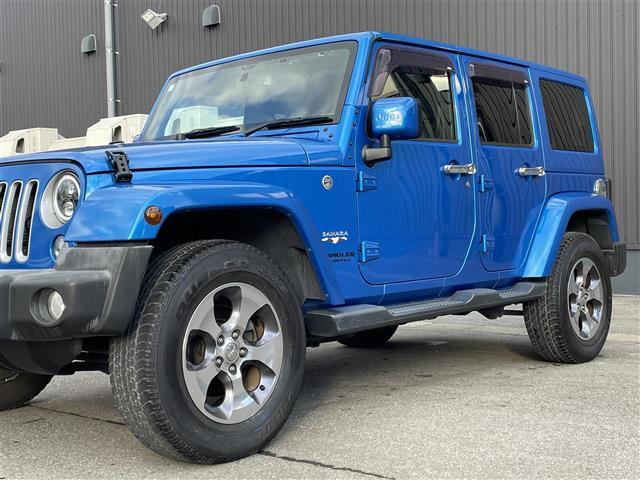 ジープ・ラングラーアンリミテッド サハラ 社外ナビ ALPINEスピーカー バックカメラ ETC 前後ドライブレコーダー 前席シートヒーター クルーズコントロール 純正フロアマット 純正アルミホイール 横滑り防止装置 ダウンヒルアシスト(16枚目)