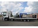 　重機運搬車　１１．９ｔ積　司工業スイングボデー　シーソー式ローダー　自動アユミ　電動ウインチ　シフトパイロット　純正バックモニター　左電動格納ミラー　アイドリングストップ　デフロック　回送車　４軸低床（50枚目）