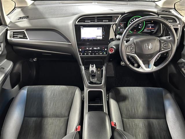 シャトル ハイブリッド メモリナビ 運転席助手席エアバッグ AAC 地デジ Bモニ 盗難防止システム VSA AUX 車線逸脱警報 シートヒーター ナビTV エアバッグ キーレス ABS スマートキー パワーウィンドウ(42枚目)