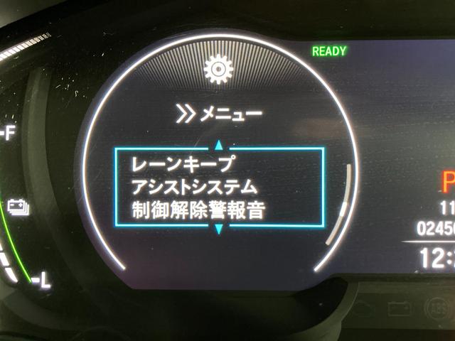 オデッセイハイブリッド ｅ：ＨＥＶアブソルート・ＥＸ　黒革シート　レーダークルーズ　衝突軽減Ｂ　レーンアシスト　ブラインドＳＭ　純正ナビＴＶ　フリップダウンモニター　３６０カメラ　パワーシート／ヒーター　パワーバックドア　エンジンスターター（56枚目）