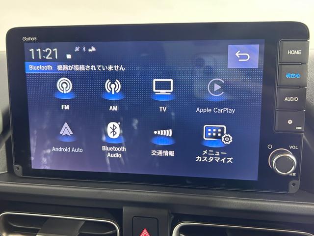 フリード ｅ：ＨＥＶクロスター　登録済未使用車　純正９ｉｎｃナビＴＶ　Ｂカメラ　レーダークルーズ　衝突軽減Ｂ　レーンアシスト　ブラインドＳＭ　両側パワースライドドア　ハーフレザー　シートヒーター　クリアランスソナー　ＬＥＤライト（4枚目）