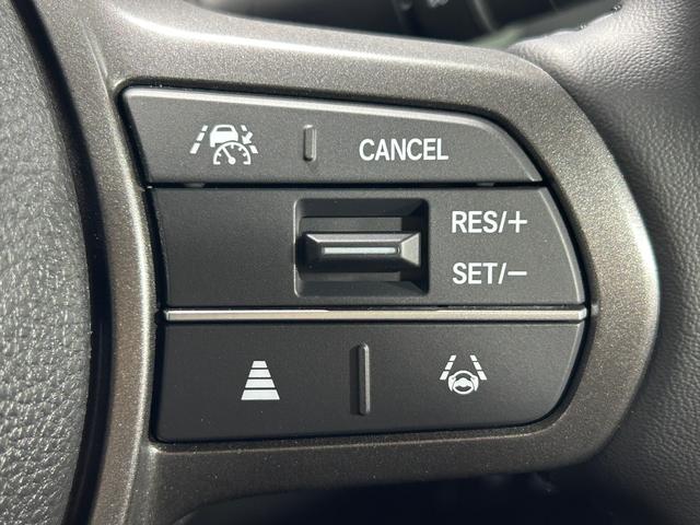 フリード ｅ：ＨＥＶクロスター　登録済未使用車　純正９ｉｎｃナビＴＶ　Ｂカメラ　レーダークルーズ　衝突軽減Ｂ　レーンアシスト　ブラインドＳＭ　両側パワースライドドア　ハーフレザー　シートヒーター　クリアランスソナー　ＬＥＤライト（6枚目）