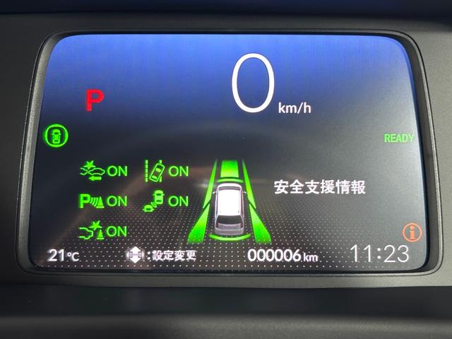 フリード ｅ：ＨＥＶクロスター　登録済未使用車　純正９ｉｎｃナビＴＶ　Ｂカメラ　レーダークルーズ　衝突軽減Ｂ　レーンアシスト　ブラインドＳＭ　両側パワースライドドア　ハーフレザー　シートヒーター　クリアランスソナー　ＬＥＤライト（31枚目）