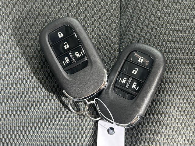 フリード ｅ：ＨＥＶクロスター　登録済未使用車　純正９ｉｎｃナビＴＶ　Ｂカメラ　レーダークルーズ　衝突軽減Ｂ　レーンアシスト　ブラインドＳＭ　両側パワースライドドア　ハーフレザー　シートヒーター　クリアランスソナー　ＬＥＤライト（39枚目）