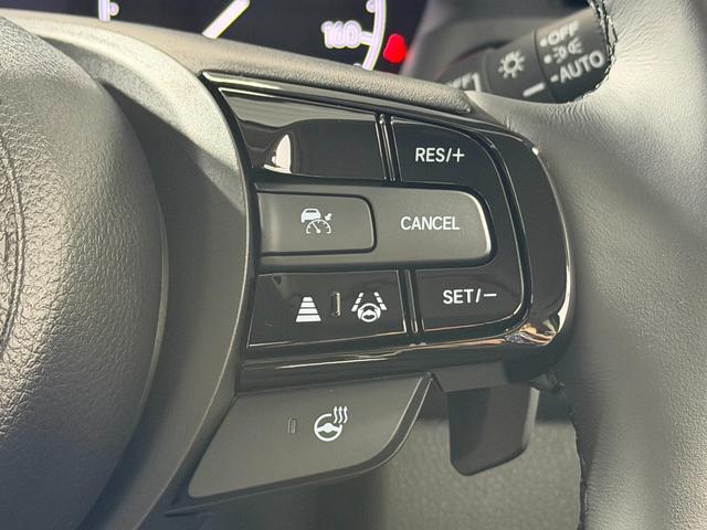 ヴェゼル e:HEV Z 登録済未使用車 純正9incナビTV バックカメラ ハーフレザー シート&ハンドルヒーター 電動リアゲート レーダークルコン 衝突軽減ブレーキ レーンアシスト BSM ダウンヒルアシスト 置き型充電(7枚目)