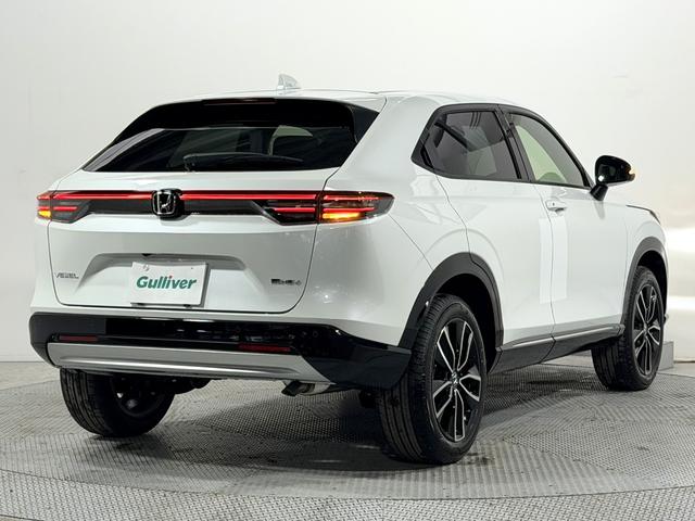 ヴェゼル e:HEV Z 登録済未使用車 純正9incナビTV バックカメラ ハーフレザー シート&ハンドルヒーター 電動リアゲート レーダークルコン 衝突軽減ブレーキ レーンアシスト BSM ダウンヒルアシスト 置き型充電(19枚目)