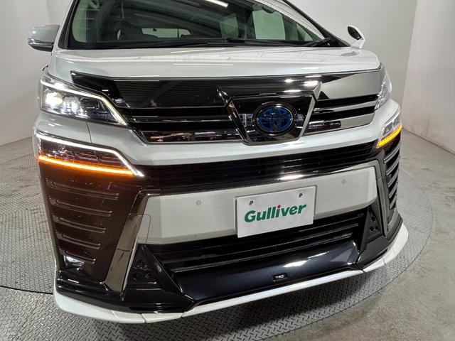ヴェルファイアハイブリッド ＺＲ　Ｇエディション　ＴＲＤエアロ　サンルーフ　黒革シート　純正ナビＴＶ　デジタルインナーミラー　フリップダウンモニター　ＣＤ／ＤＶＤプレイヤー　３眼ＬＥＤ　レーダーＣ　ＰＣＳ　ＬＫＡ　ＢＳＭ　パワーバックドア（19枚目）