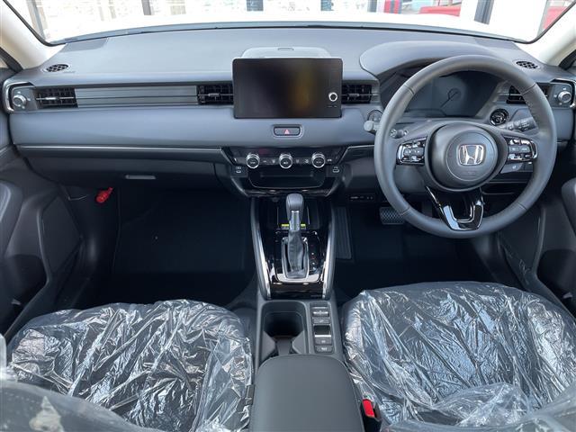 ヴェゼル e:HEV Z 登録済未使用車/純正9インチコネクトナビ/電動リアゲート/レーダークルーズコントロール/バックカメラ/ハーフレザーシート/シートヒーター/コーナーセンサー/ワイヤレス充電/LEDヘッドライト/ETC(2枚目)