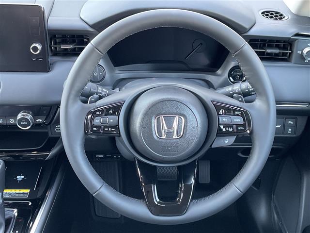 ヴェゼル e:HEV Z 登録済未使用車/純正9インチコネクトナビ/電動リアゲート/レーダークルーズコントロール/バックカメラ/ハーフレザーシート/シートヒーター/コーナーセンサー/ワイヤレス充電/LEDヘッドライト/ETC(9枚目)