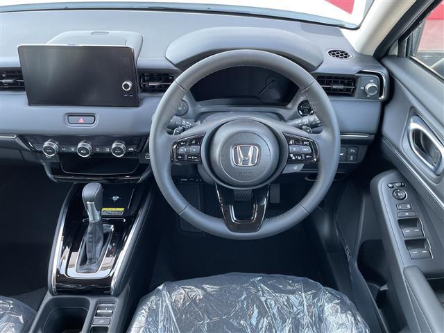 ヴェゼル e:HEV Z 登録済未使用車/純正9インチコネクトナビ/電動リアゲート/レーダークルーズコントロール/バックカメラ/ハーフレザーシート/シートヒーター/コーナーセンサー/ワイヤレス充電/LEDヘッドライト/ETC(10枚目)