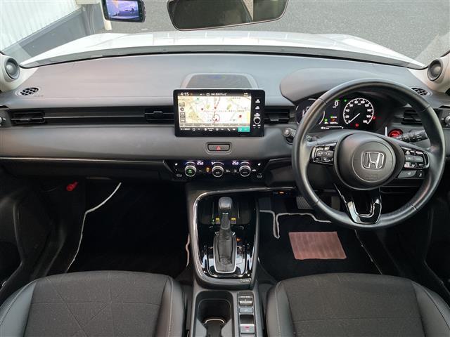 ヴェゼル ｅ：ＨＥＶ　Ｚ　ワンオーナー／純正９インチナビ／全方位カメラ／地デジＴＶ／ＢＴ／クルーズコントロール／純正ＯＰグリル／純正ＯＰプレミアムオーディオ／純正１８インチアルミホイール／ワイヤレス充電／ＥＴＣ２．０／ドラレコ（2枚目）